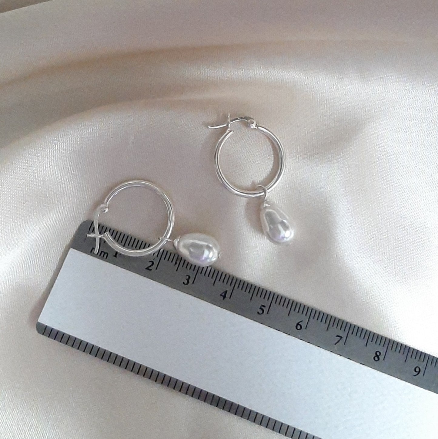 Swarovski crystal pear shaped pearl drop and 20mm sterling silver hoop earrings