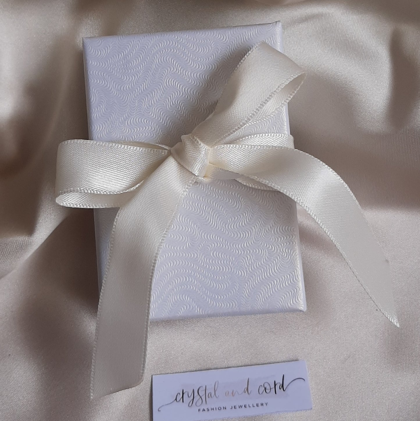 Zara - Cubic Zirconia crystal clear pear shaped drop and stud earrings