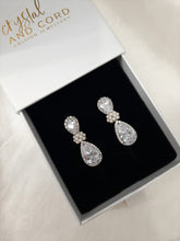 Load image into Gallery viewer, Angelica - Cubic Zirconia crystal clear silver-tone pear shaped drop stud earrings