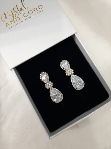 Angelica - Cubic Zirconia crystal clear silver-tone pear shaped drop stud earrings