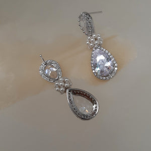 Angelica - Cubic Zirconia crystal clear silver-tone pear shaped drop stud earrings