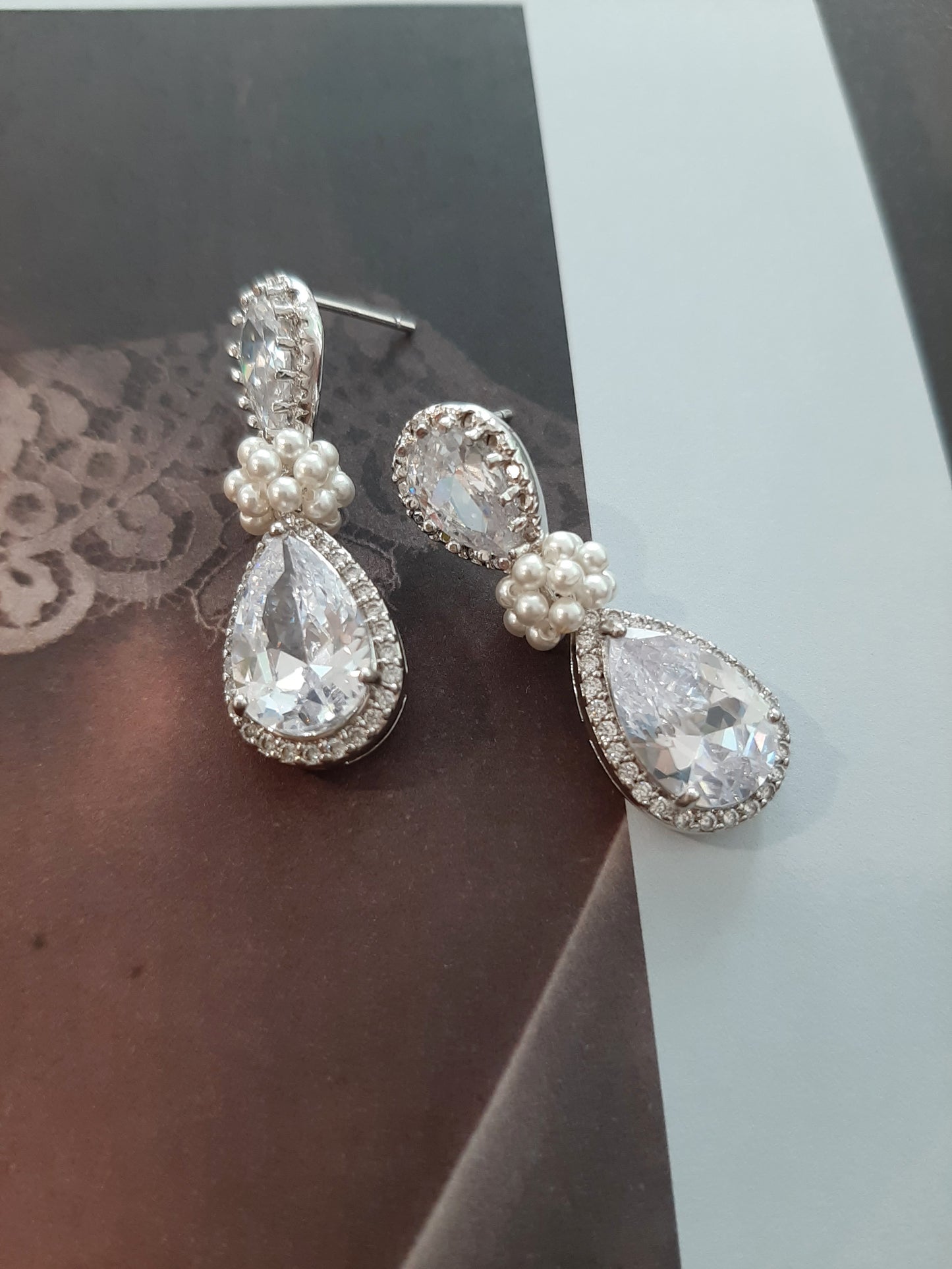 Angelica - Cubic Zirconia crystal clear silver-tone pear shaped drop stud earrings