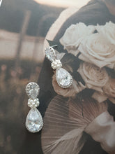 Load image into Gallery viewer, Angelica - Cubic Zirconia crystal clear silver-tone pear shaped drop stud earrings