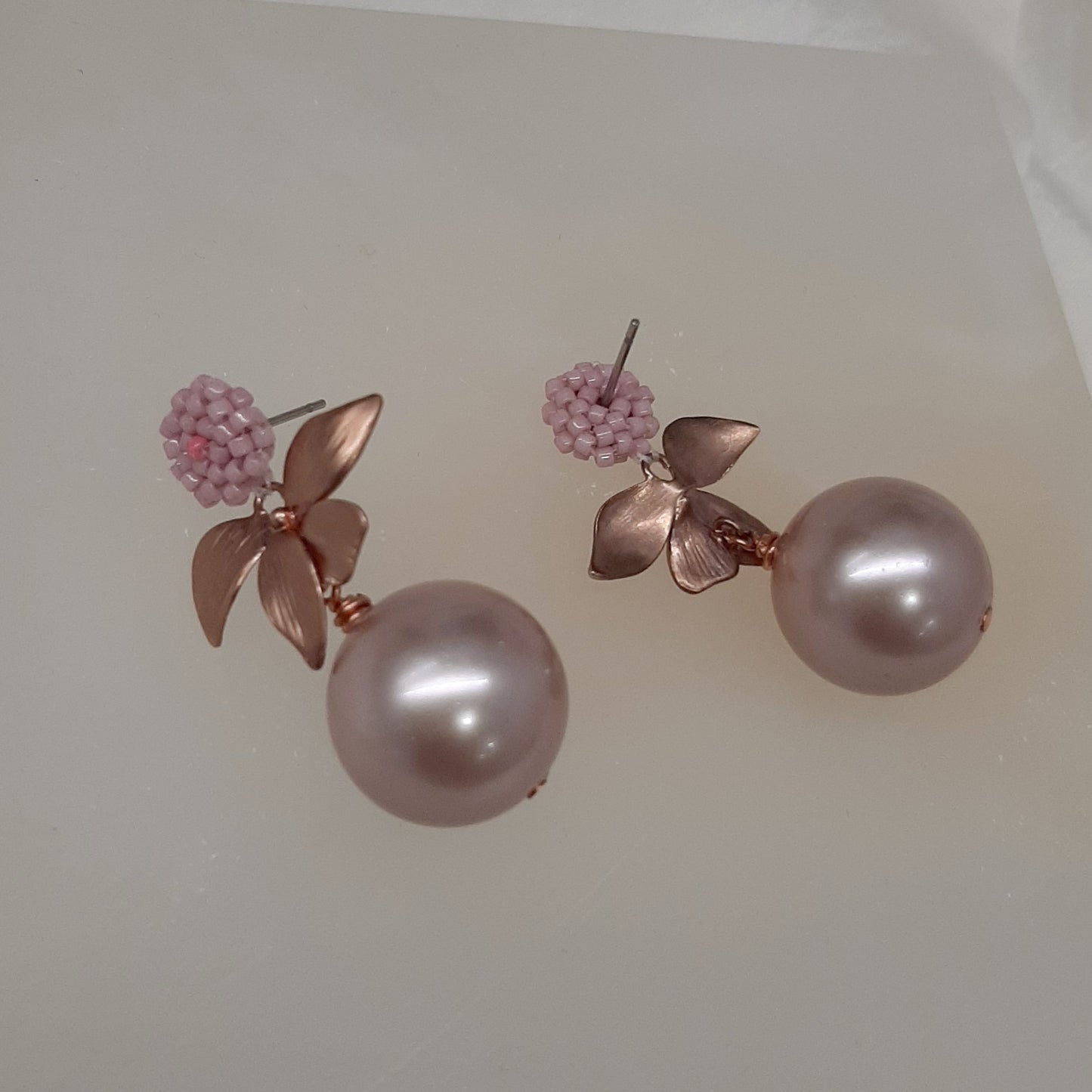 Arella - round shell bead pearl single orchid shaped flower drop earrings
