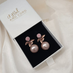 Arella - round shell bead pearl single orchid shaped flower drop earrings