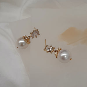 Calista - cubic zirconia stud and embellished pearl drop earrings