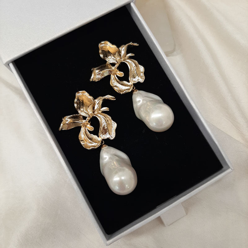 Clarissa - golden orchid shape flower and cascading pearl drop earrings