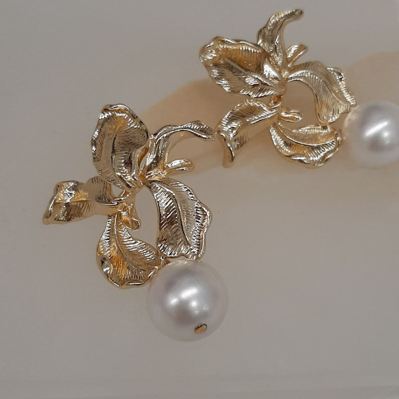 Clarissa - golden orchid shape flower and cascading pearl drop earrings