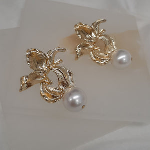 Clarissa - golden orchid shape flower and cascading pearl drop earrings