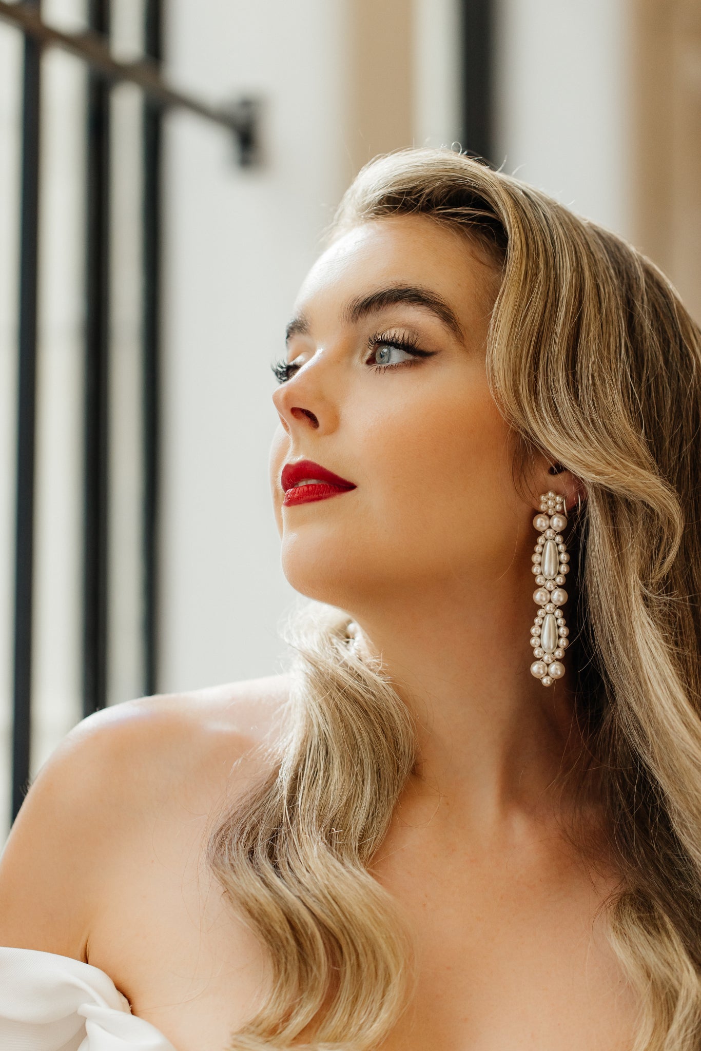 Elizabeth - white round and teardrop shaped crystal pearls cascading stud earrings