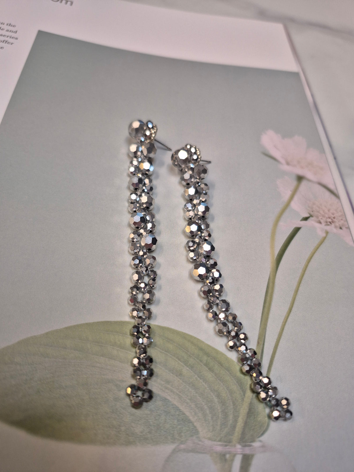 Emiliana Chrome - faceted silver beads long cascading drip earrings