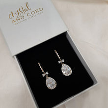Load image into Gallery viewer, Eve - Cubic Zirconia crystal clear pear shaped drop and bow earrings