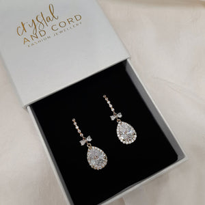Eve - Cubic Zirconia crystal clear pear shaped drop and bow earrings