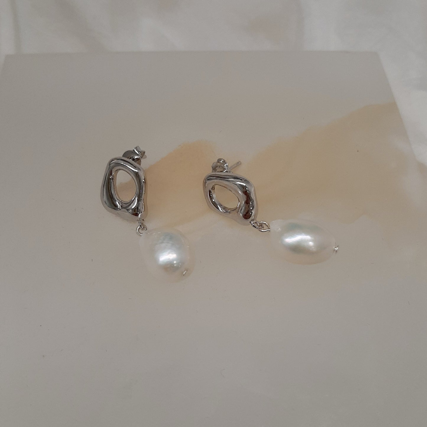 Haisley - silver or gold tone oval hoop and pearl drop earrings