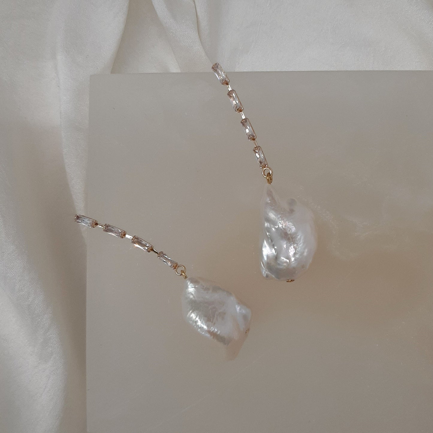 Isla - cubic zirconia's embellished and natural cultured freshwater pearls cascading earrings