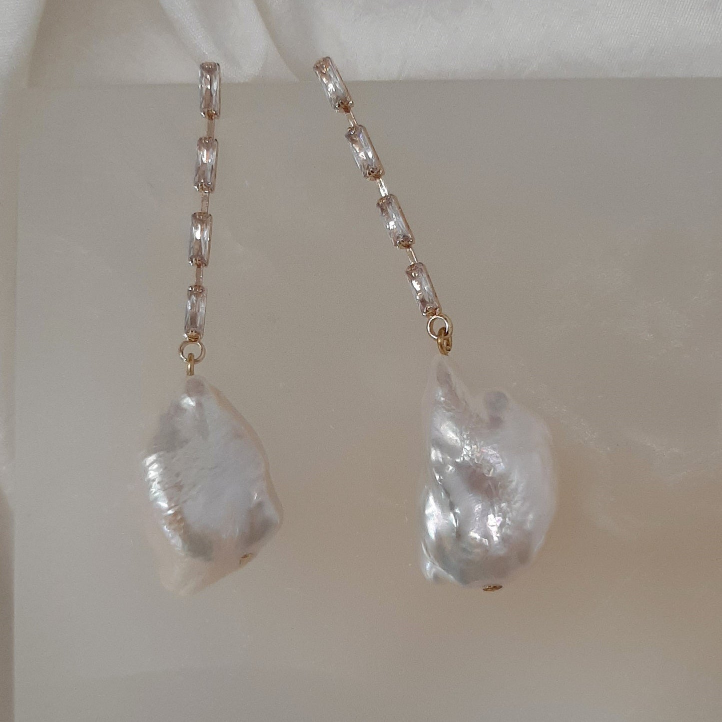Isla - cubic zirconia's embellished and natural cultured freshwater pearls cascading earrings