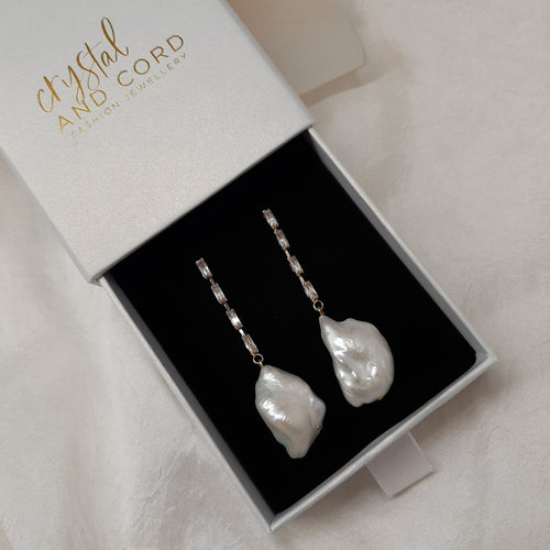 Isla - cubic zirconia's embellished and natural cultured freshwater pearls cascading earrings