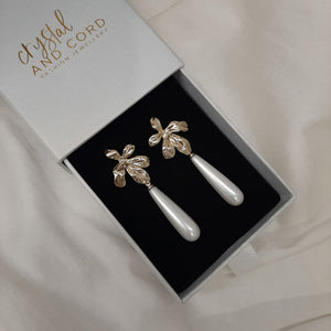 Juliette  - golden orchid shape flower and cascading pearl drop earrings