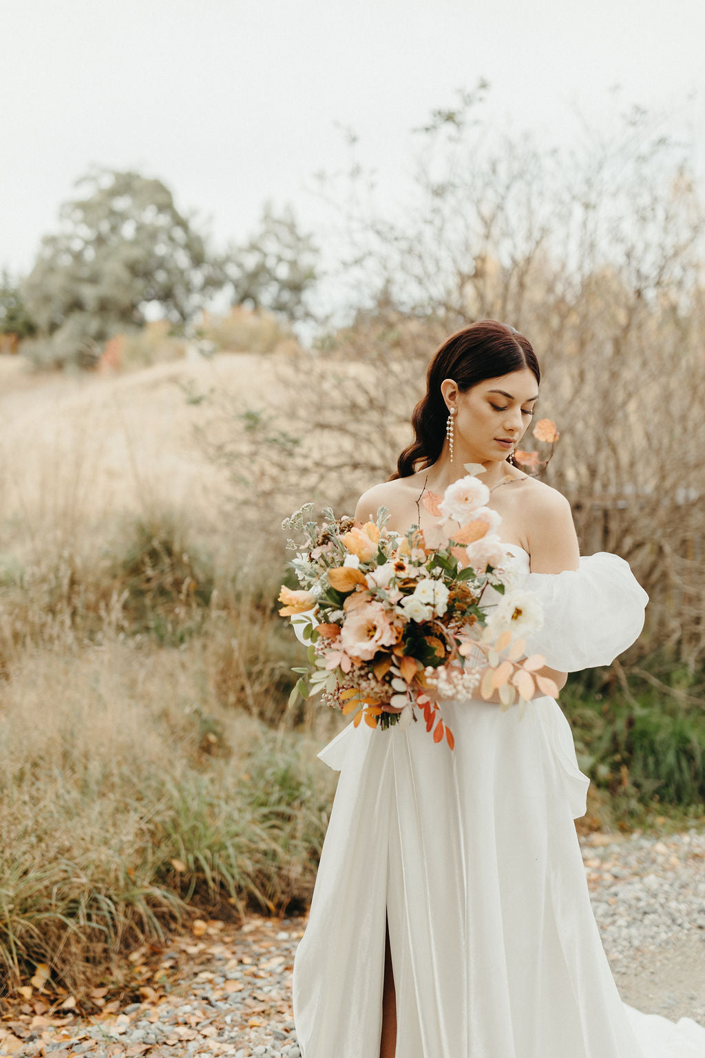 Linelle - freshwater pearls oval stud and tapered multi cascading earrings