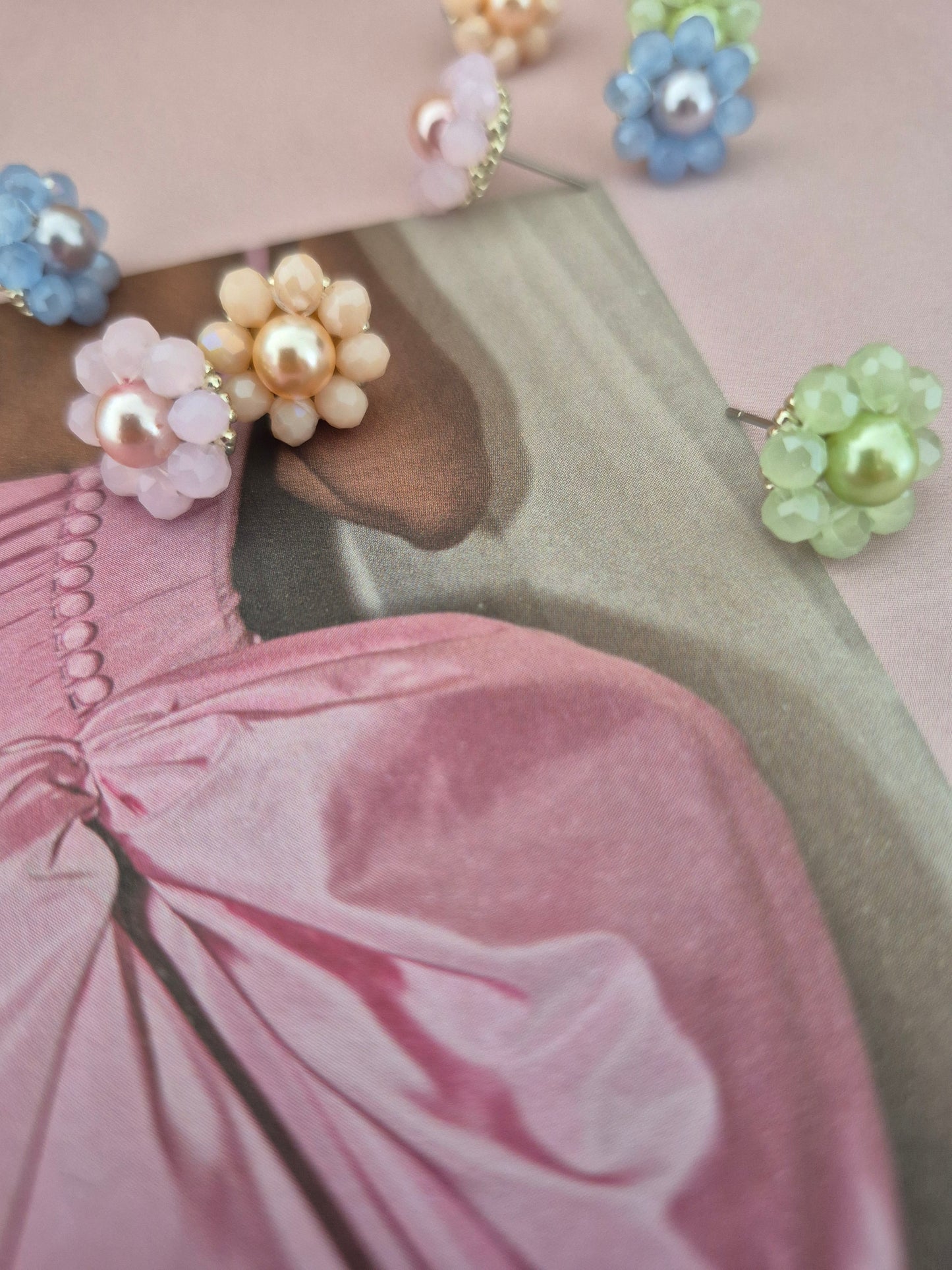 Maddie - flower shaped stud earrings with glass beads and a pearl center