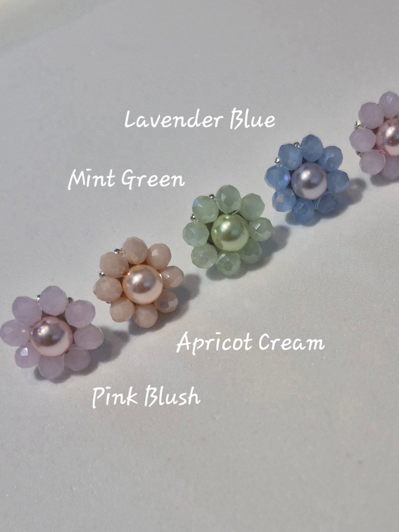 Maddie - flower shaped stud earrings with glass beads and a pearl center
