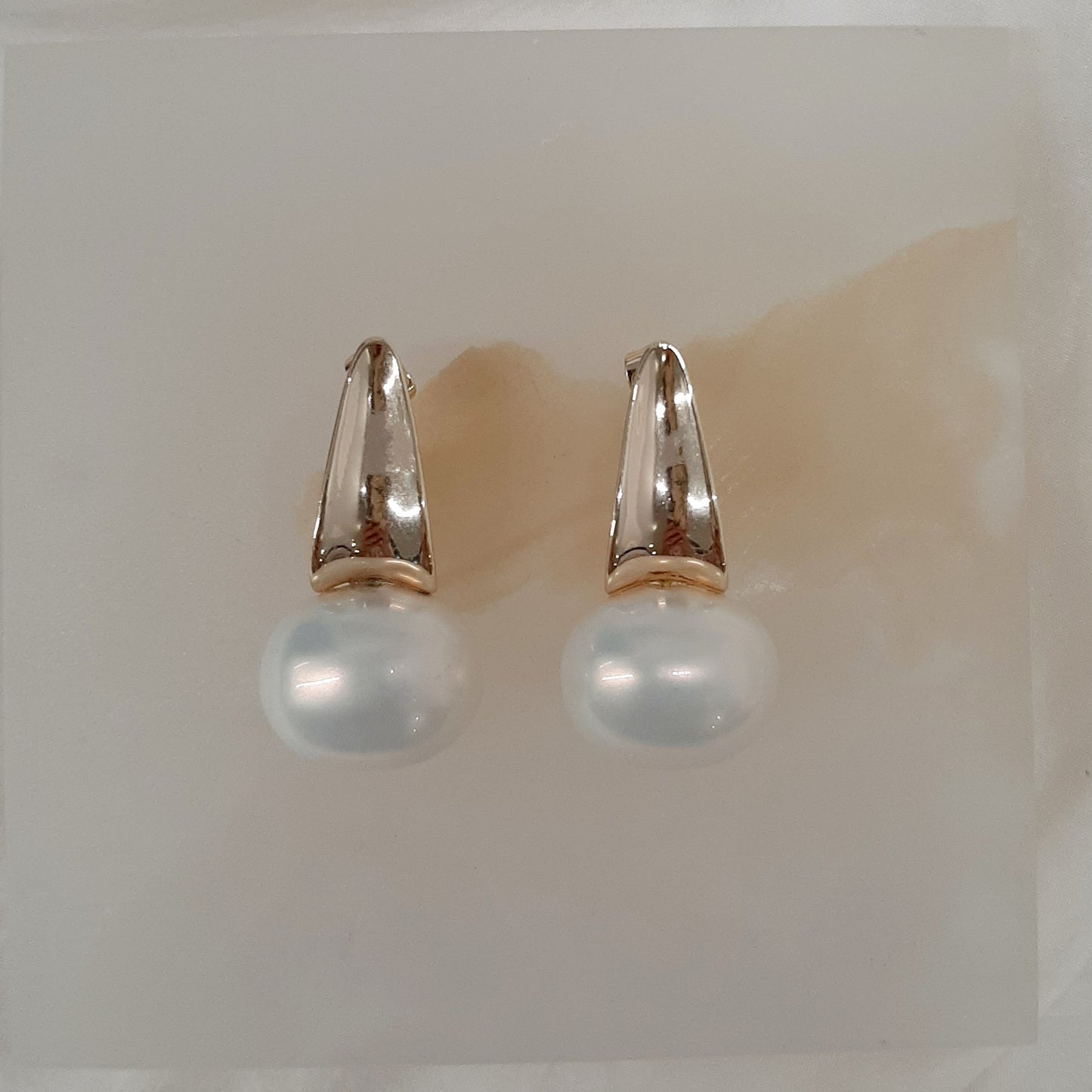 Nadine - oval shell bead pearl and gold tone droplet stud earrings