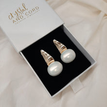 Load image into Gallery viewer, Nadine - oval shell bead pearl and gold tone droplet stud earrings
