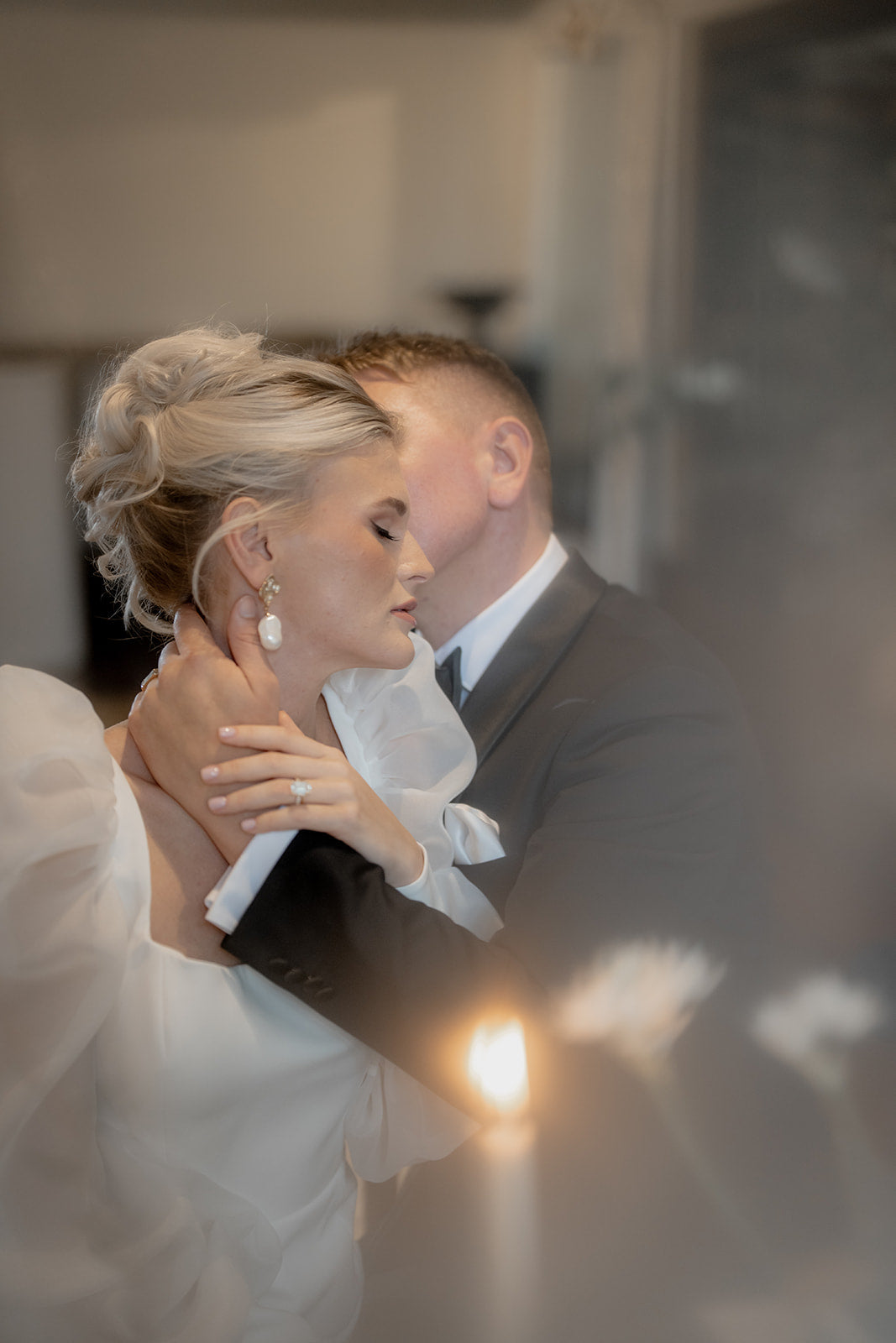 Monica - faux pearl drop and gold tone five petal flower stud earrings