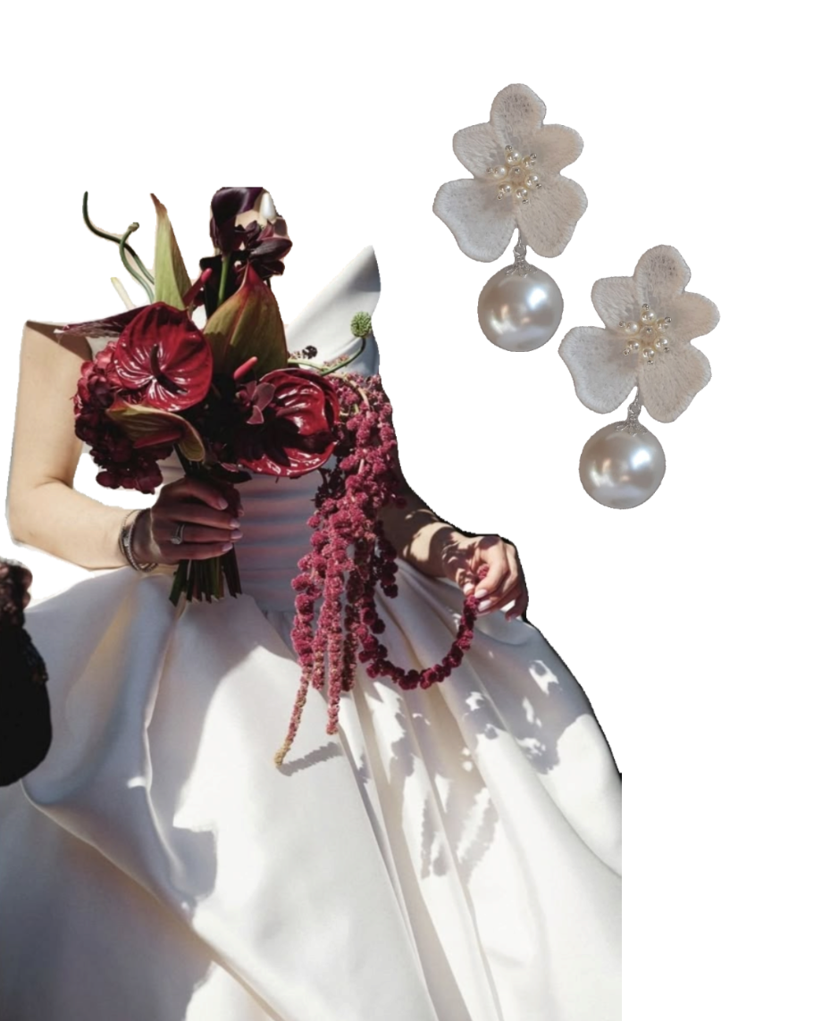 A pair of white lace flower-shaped drop earrings with round pearl drops and small pearl centers, shown beside a bride in a white wedding dress holding a dark red floral bouquet on a white background.