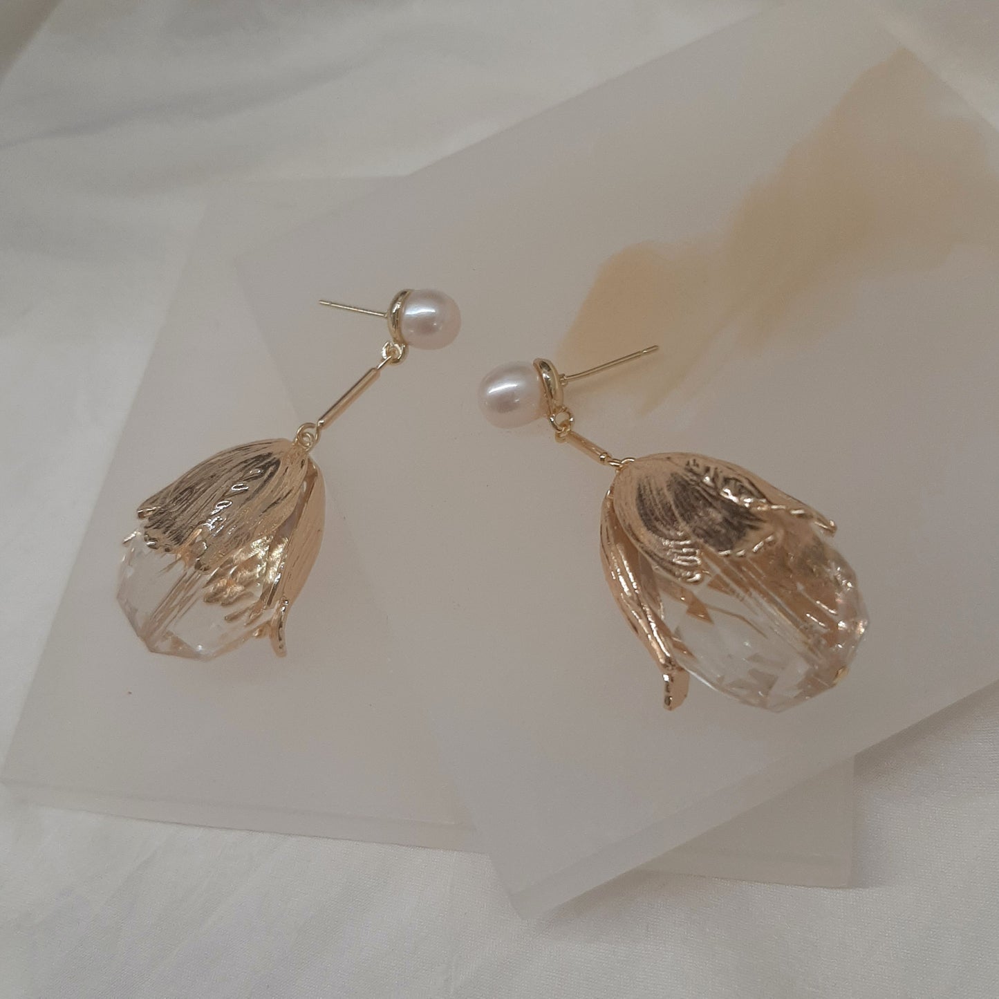 Susannah - glass faceted crystal clear teardrop and gold tone stud earrings