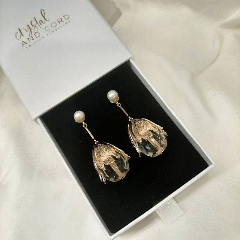 Susannah - glass faceted crystal clear teardrop and gold tone stud earrings