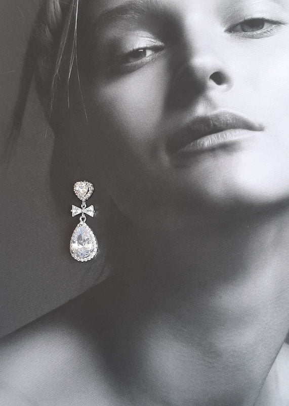 Yvette - Cubic Zirconia crystal clear heart, bow and pear shaped drop silver-tone stud earrings
