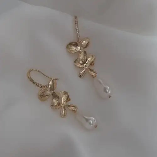 Abby - Silver or gold tone, cubic zirconia earwires and orchid shaped flowers with Swarovski crystal baroque pearl drop earrings