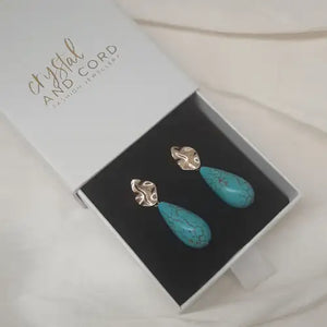 Calinda - blue turquoise colour long teardrop and gold-tone oval earstud earrings - Calinda