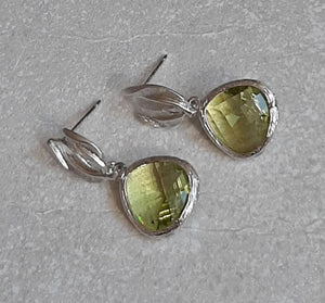 Peridot faceted glass bead and silver-tone leaf drop stud earrings