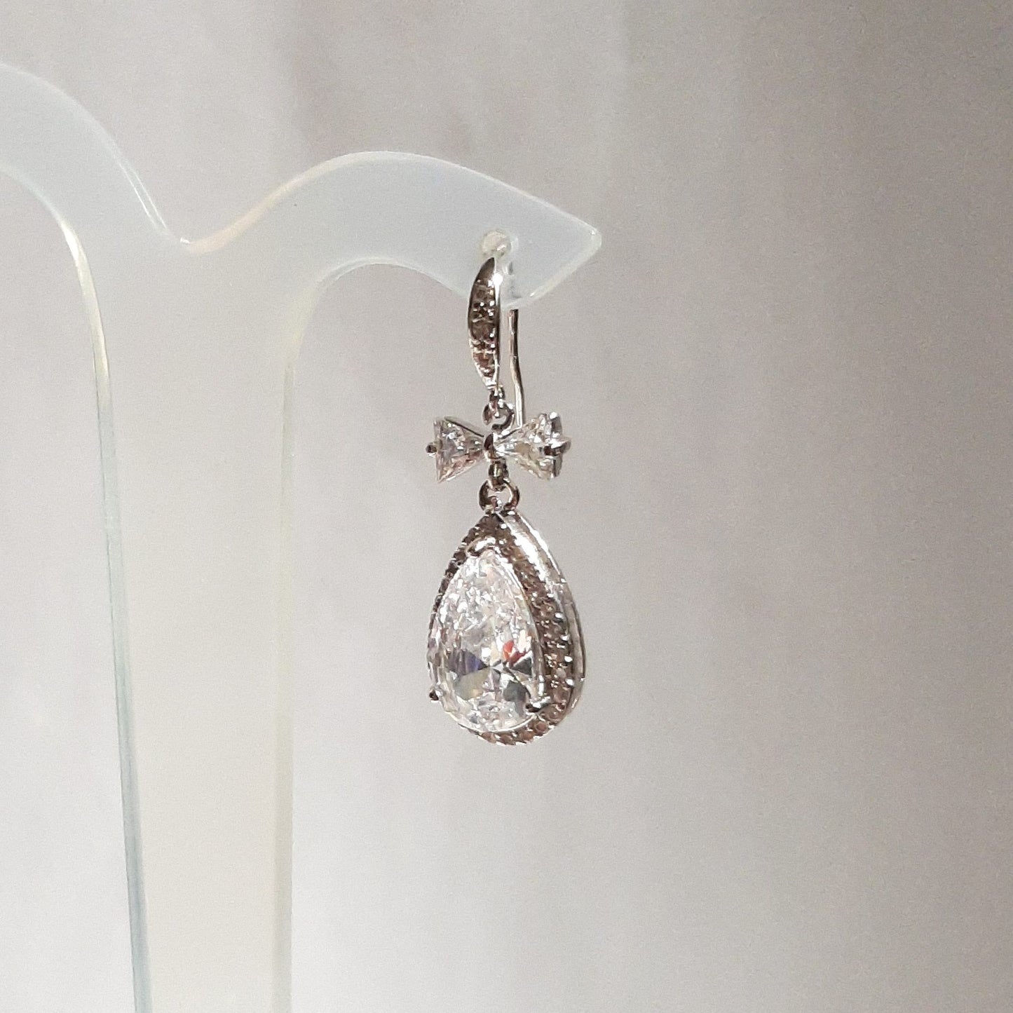 Yvette - Cubic Zirconia crystal clear heart, bow and pear shaped drop silver-tone stud earrings