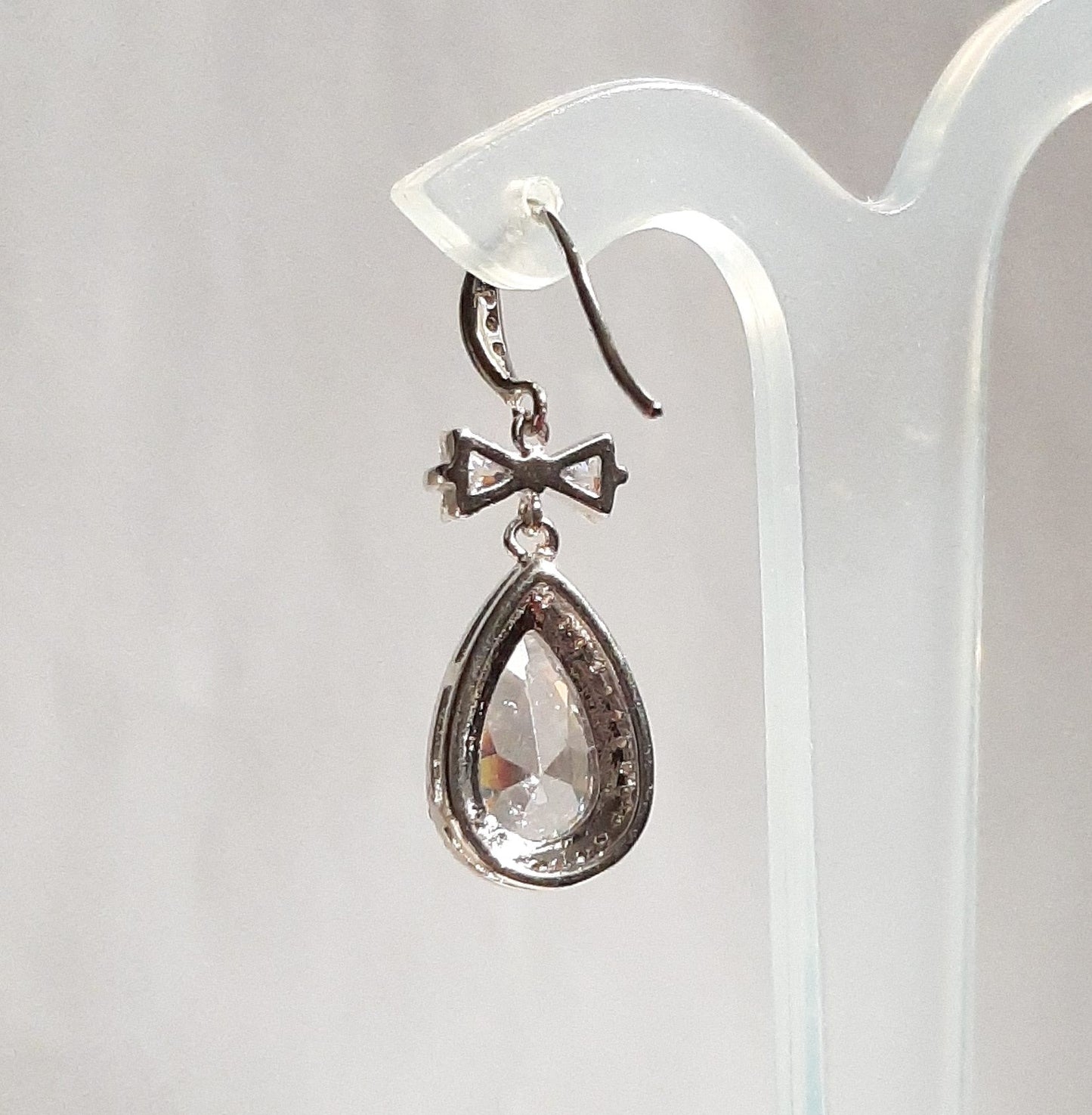 Yvette - Cubic Zirconia crystal clear heart, bow and pear shaped drop silver-tone stud earrings