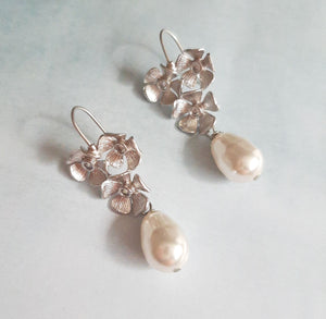 Maia - silver-tone triple flower rhinestone centered pearl drop earrings