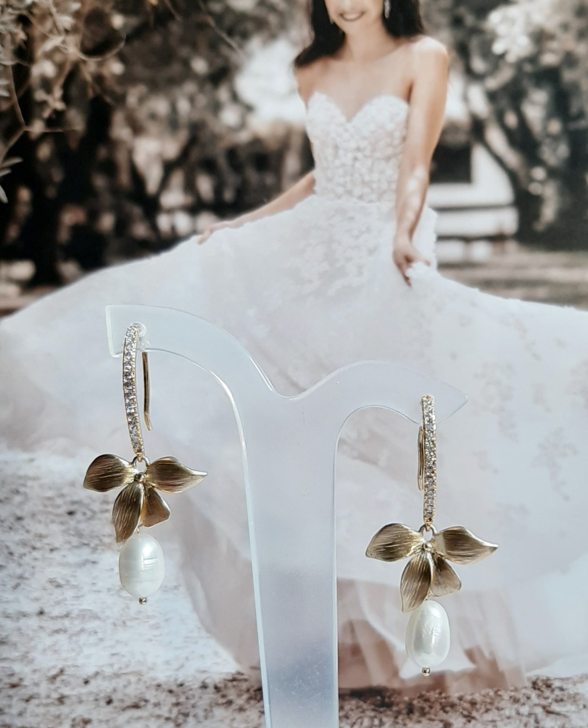 Freshwater pearls and gold-tone single orchid flower drop earrings