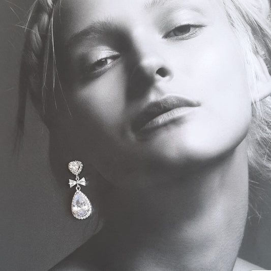 Yvette - Cubic Zirconia crystal clear heart, bow and pear shaped drop silver-tone stud earrings