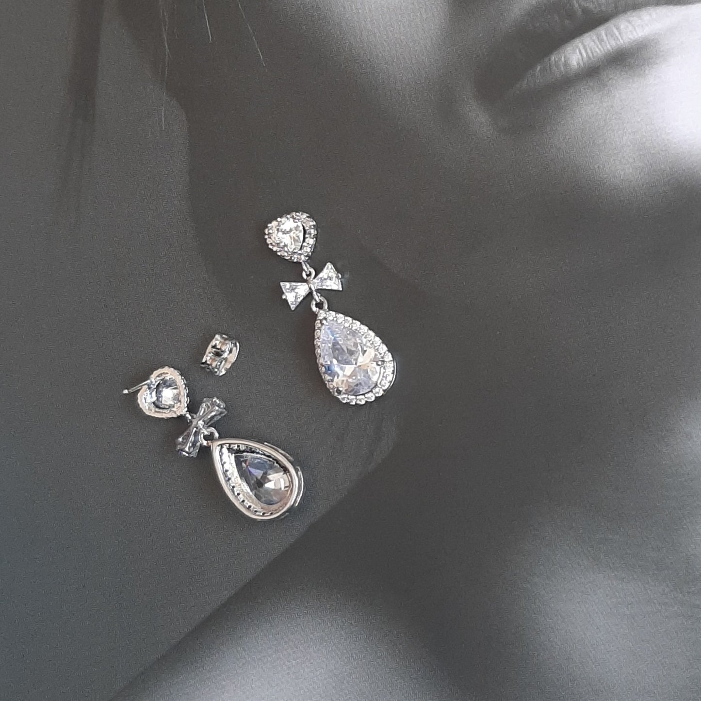 Yvette - Cubic Zirconia crystal clear heart, bow and pear shaped drop silver-tone stud earrings