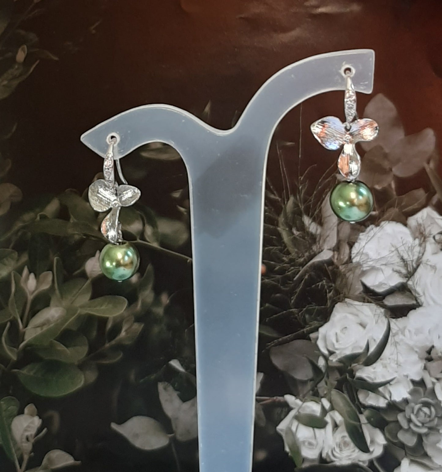 Rachel - faux pearl and small shiny silver-tone orchid shaped flower drop earrings