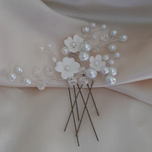 Load image into Gallery viewer, White flowers, glass bead pearls, and crystal clear faceted beads set of three hair pins