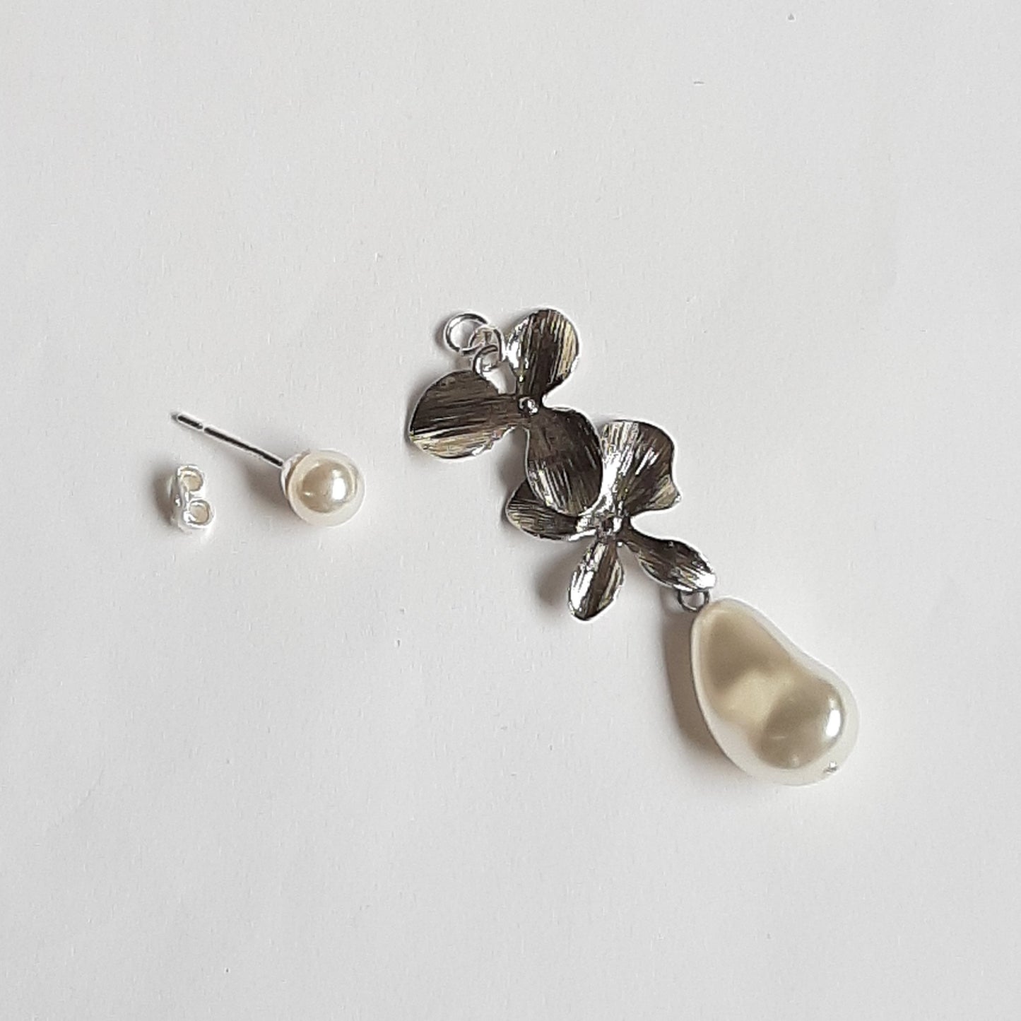 Matilda - silver orchid shaped flowers with Swarovski crystal baroque pearl drop and earstud