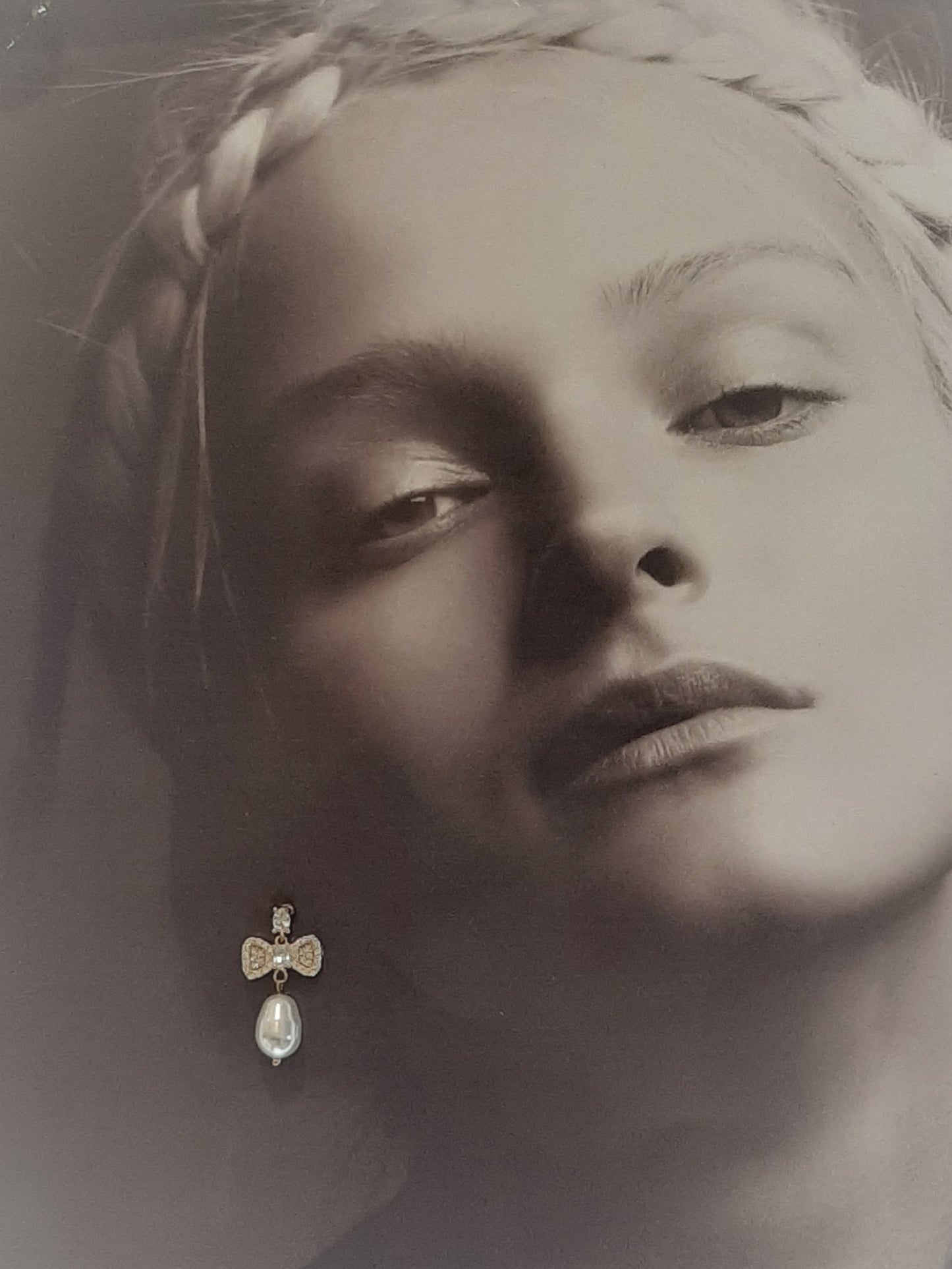 Hazel - Swarovski crystal pearl drop and cubic zirconia bow gold-tone stud earrings