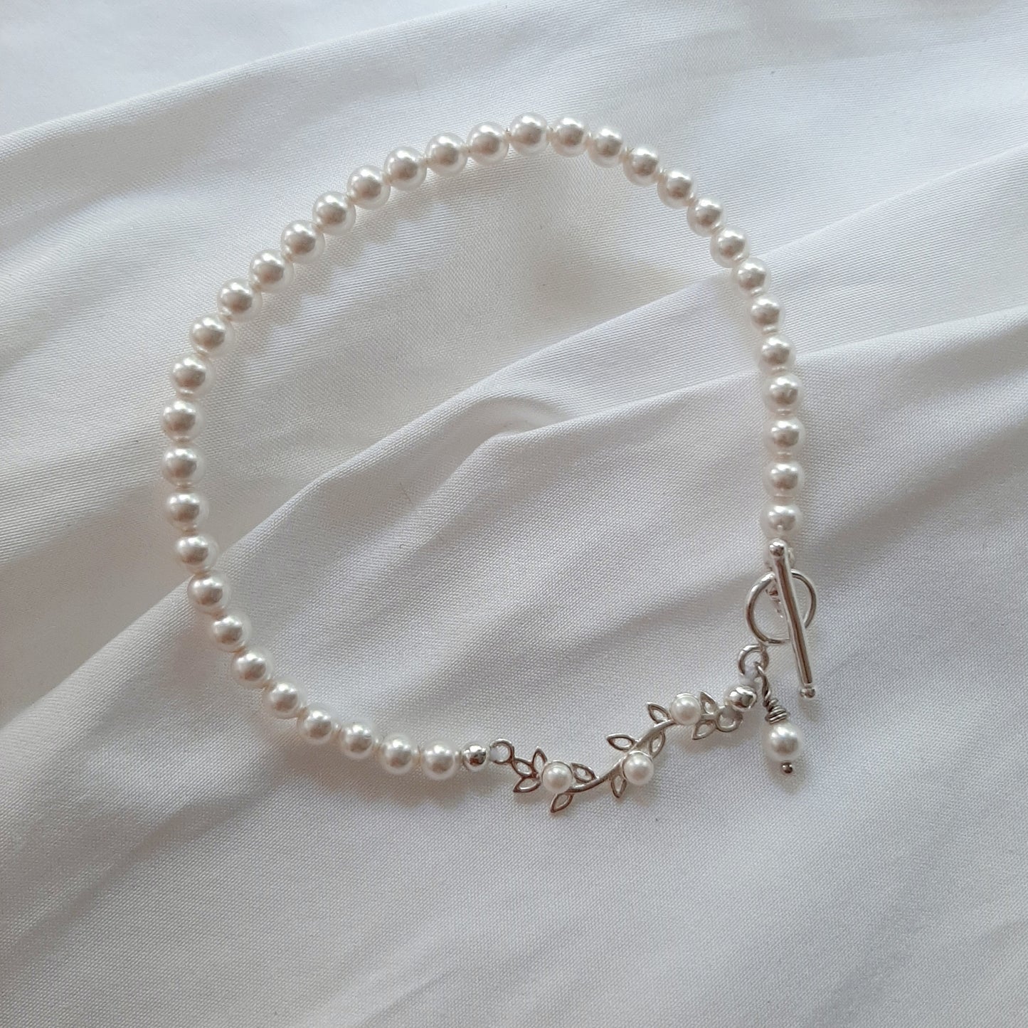 Isabelle - pear shaped pearl and sterling silver vine drop earrings and bracelet