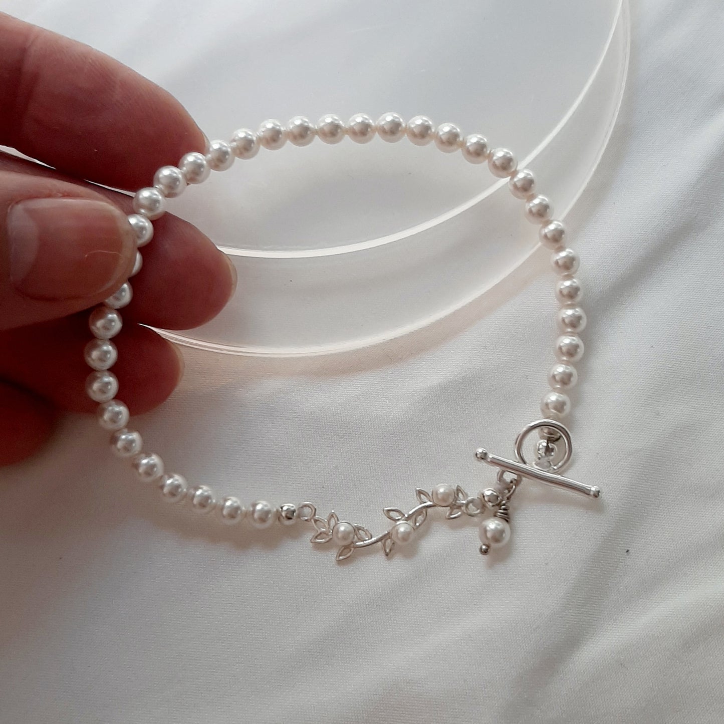 Isabelle - pear shaped pearl and sterling silver vine drop earrings and bracelet