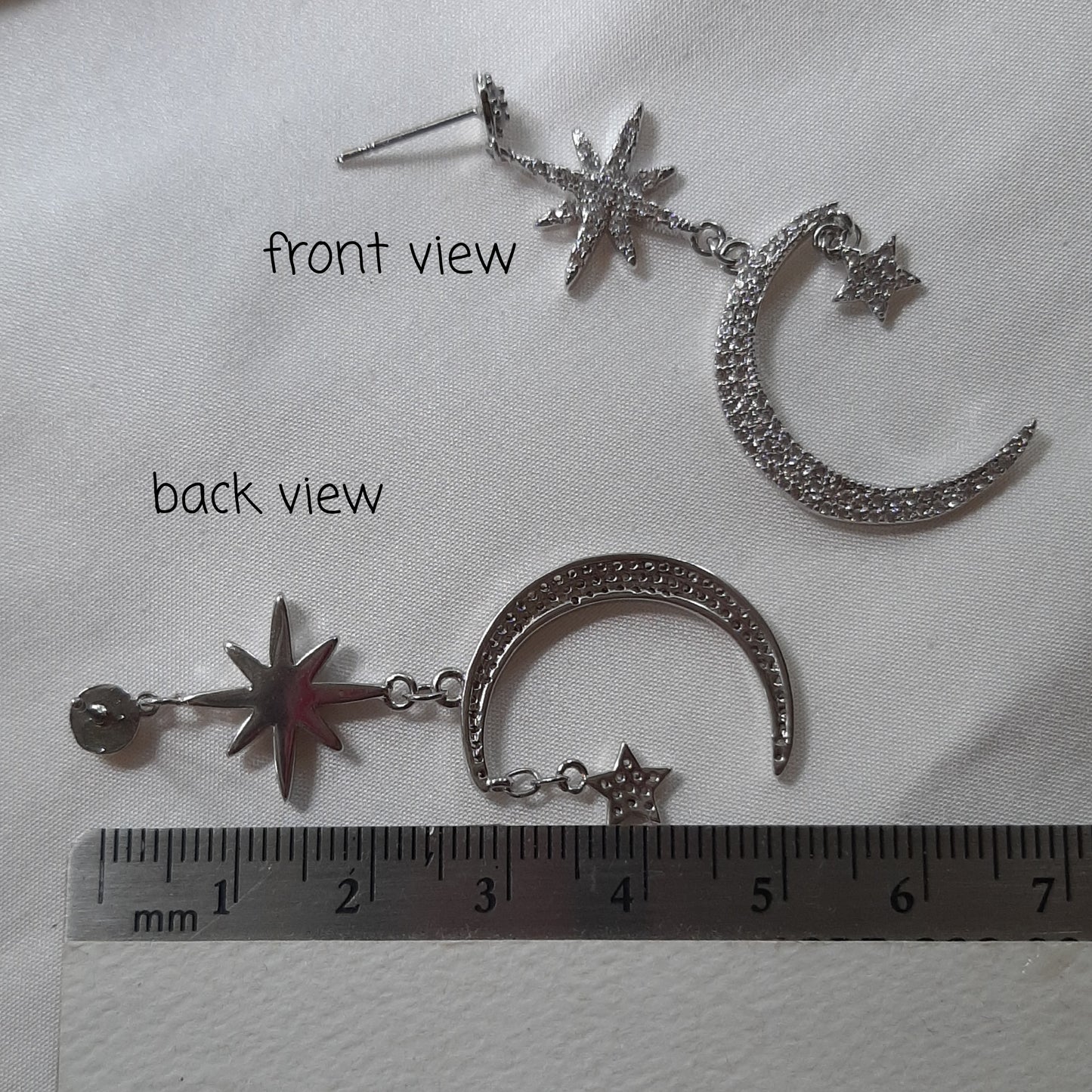 Narvi - Crystal clear Cubic Zirconia's stars and moon silver-tone drop stud earrings