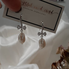 Load image into Gallery viewer, Stella - cultured freshwater pearl pear shaped drop earrings with cubic zirconia studded bow and earwires