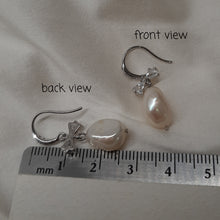 Load image into Gallery viewer, Stella - cultured freshwater pearl pear shaped drop earrings with cubic zirconia studded bow and earwires